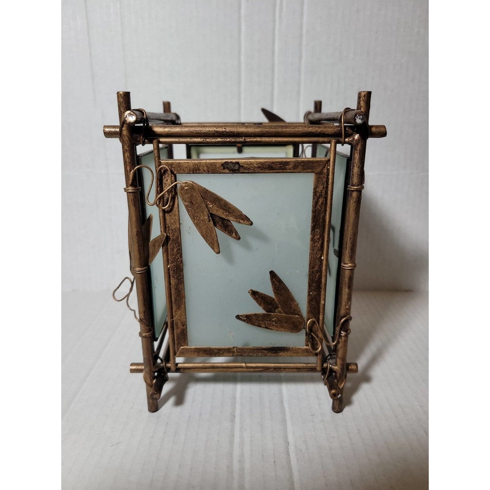Feng Shui metal and glass candle holder
